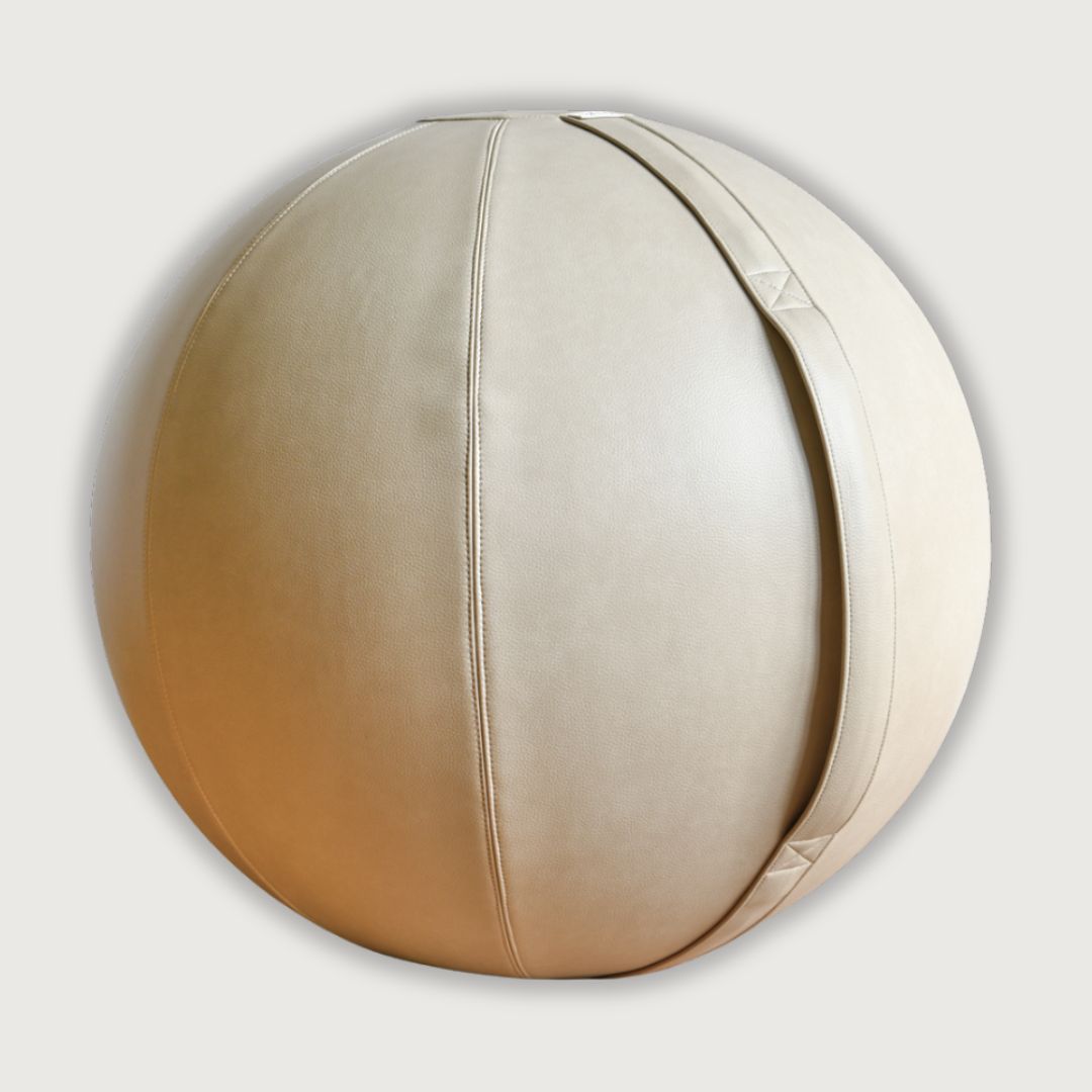 beige leather sitting ball