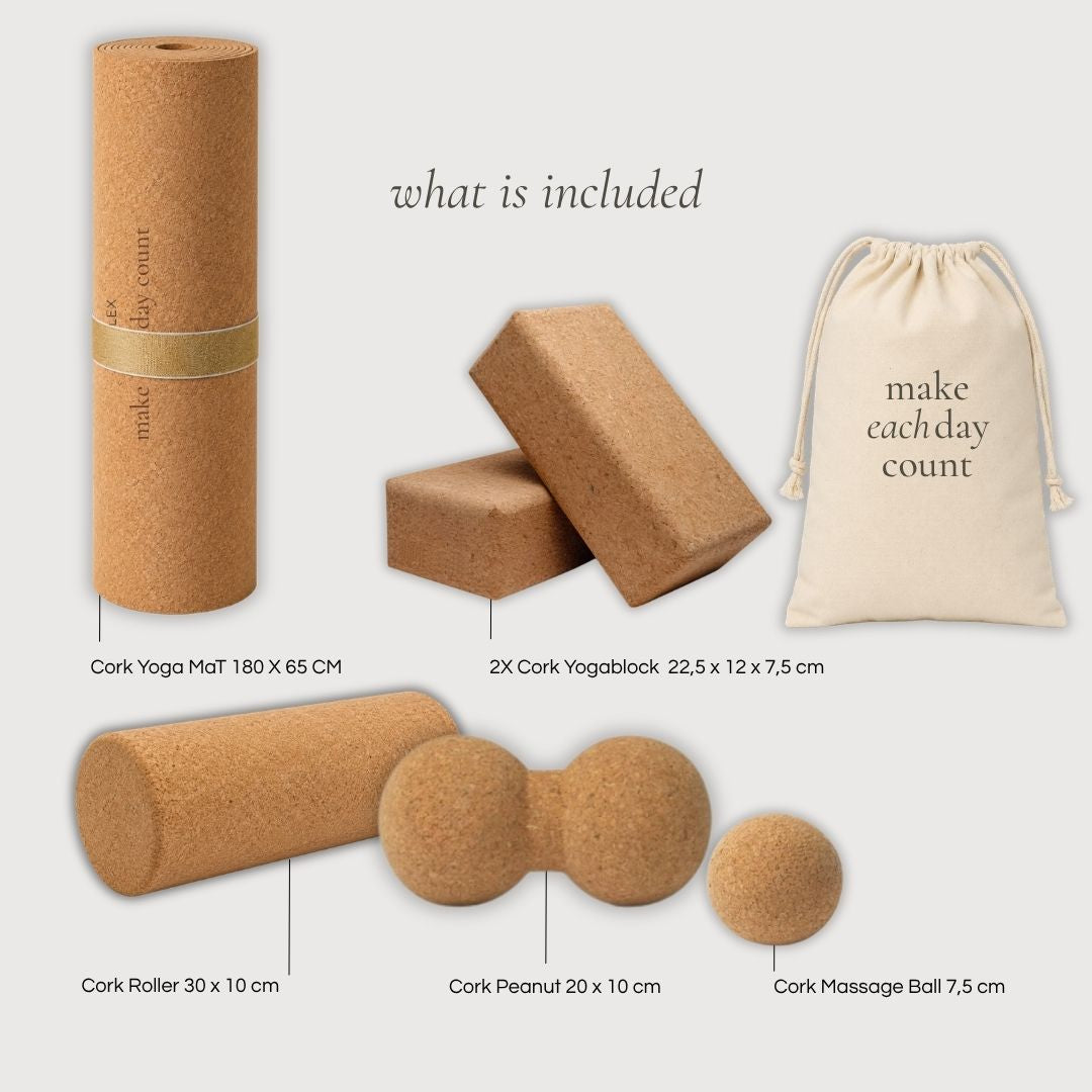 Yoga mat and exercise block set including a cork yoga mat, two cork yoga blocks, a drawstring bag, a cork roller, a cork peanut, and a massage ball
